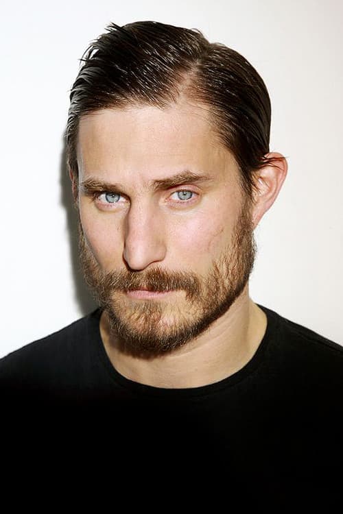 Clemens Schick as Mike in Dogman
