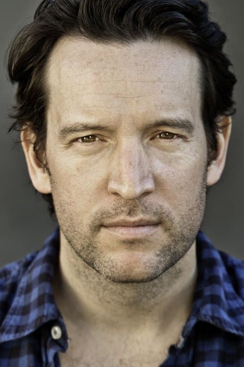 John Pollono as Frank Romanowski in Small Engine Repair