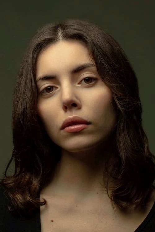 Aya Wolf as Mia in Mia