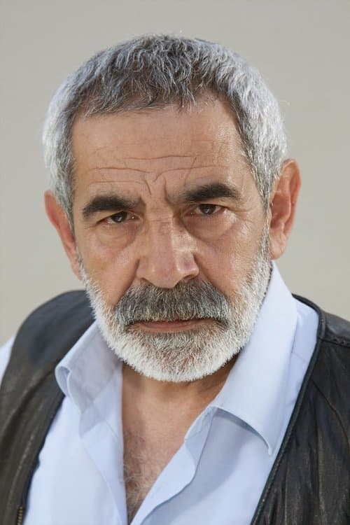 Turgay Tanülkü as Tahsin in Paper Lives