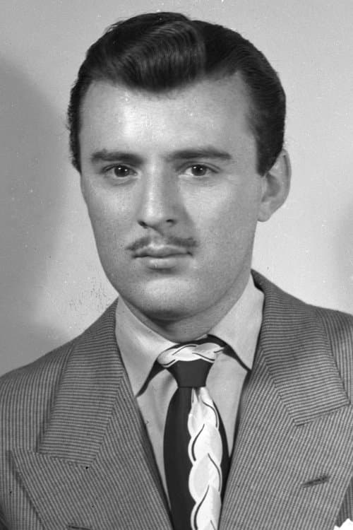 Manolo Fábregas as Colonel Beltran in Two Mules for Sister Sara