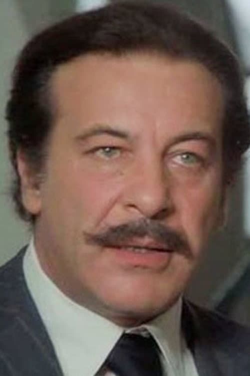 Giuseppe Anatrelli as Luciano Calboni in Fantozzi: White Collar Blues
