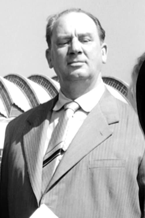 Ettore Geri as Mr. Bausetti in The Boom