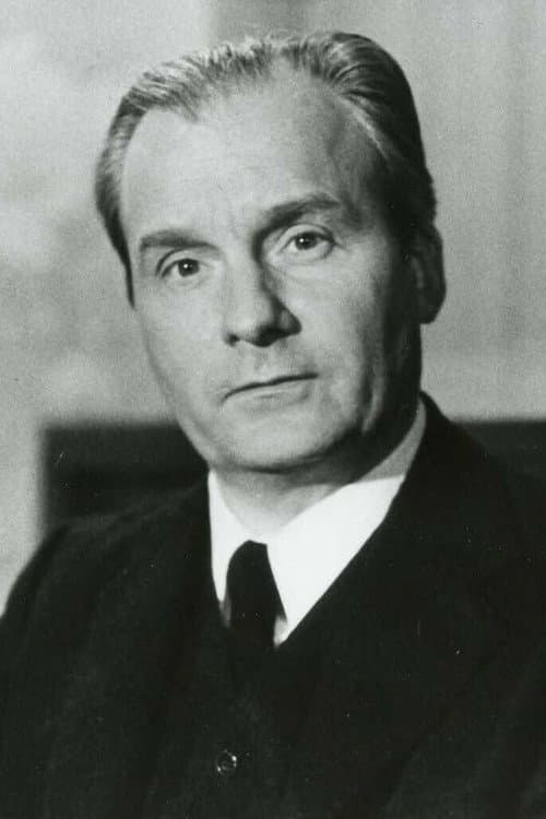 Michel Bouquet as Comolli in Mississippi Mermaid