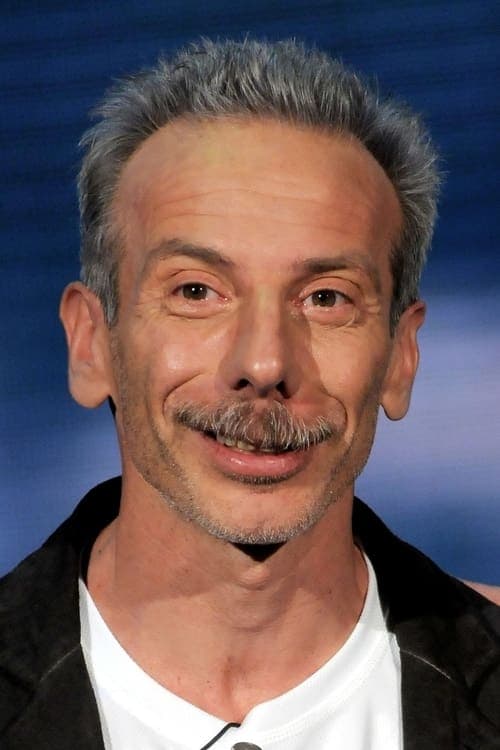 Giovanni Storti as Giovanni / John / Controllore tram / Gino in Three Men and a Leg