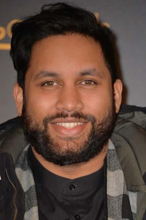 Kévin Razy as Ben, Radio Animator in The Climb
