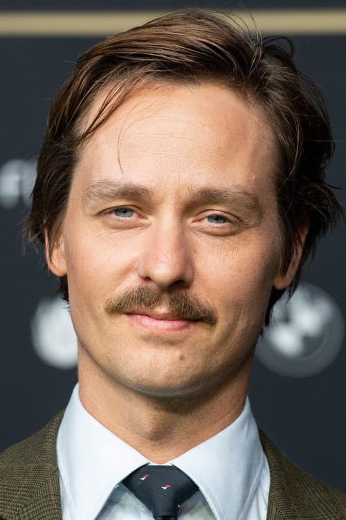 Tom Schilling as Kurt Barnert in Never Look Away