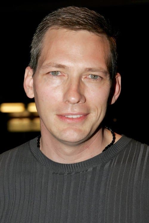 Darren E. Burrows as Elliot in Love Is Strange